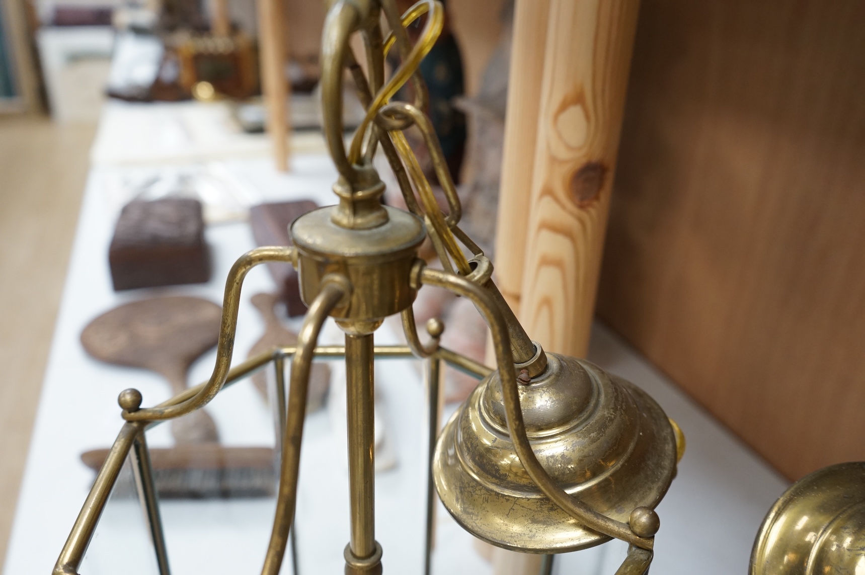 A pair of French octagonal glass and brass lanterns, 40cm